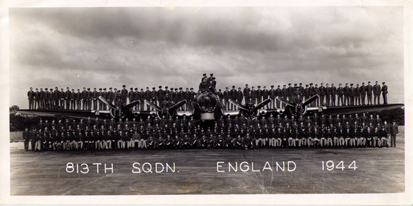 813th Bomb Squadron Group photo taken on top of a B-17