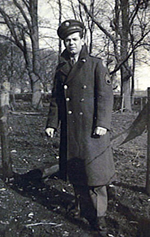 old, black and white picture of John Oneil outdoors in his Air Force uniform.
